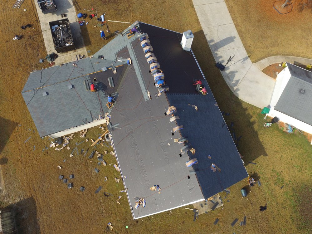 Slide of Empire Roofing & Restoration