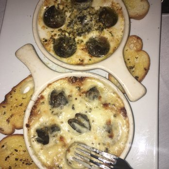 Spinners Rooftop Grille - Escargot - Lounges Near Me - St. Pete Beach, Florida Spinners Rooftop Grille - Escargot - Lounges Near Me - St. Pete Beach, Florida
