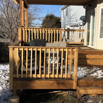 J.D. Moore Building and Tile - a deck with a pergol roof - General Contractors Near Me J.D. Moore Building and Tile - a deck with a pergol roof - General Contractors Near Me