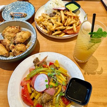 Namu Kitchen - House chicken wings (left), Lomo saltado (top), Macaroni with filet mignon beef (bottom), lychee peachee (drink) - Breakfast & Brunch Near Me - West Covina, California Namu Kitchen - House chicken wings (left), Lomo saltado (top), Macaroni with filet mignon beef (bottom), lychee peachee (drink) - Breakfast & Brunch Near Me - West Covina, California