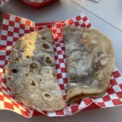 Antojitos Copanecos - Baleadas sencillas (Flour tortilla with refried beans, cheese, and Honduran sour cream)