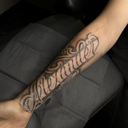 OC Tattoo - Script lettering by J OC Tattoo Artist