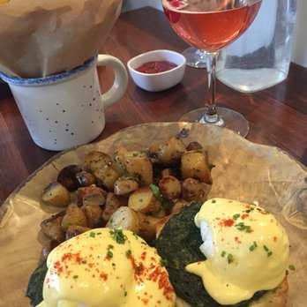 Unconventional Diner - Benedict (spinach) with potatoes, sexy fries, and a cranmosa - Breakfast & Brunch Near Me - Washington, DC, District of Columbia Unconventional Diner - Benedict (spinach) with potatoes, sexy fries, and a cranmosa - Breakfast & Brunch Near Me - Washington, DC, District of Columbia