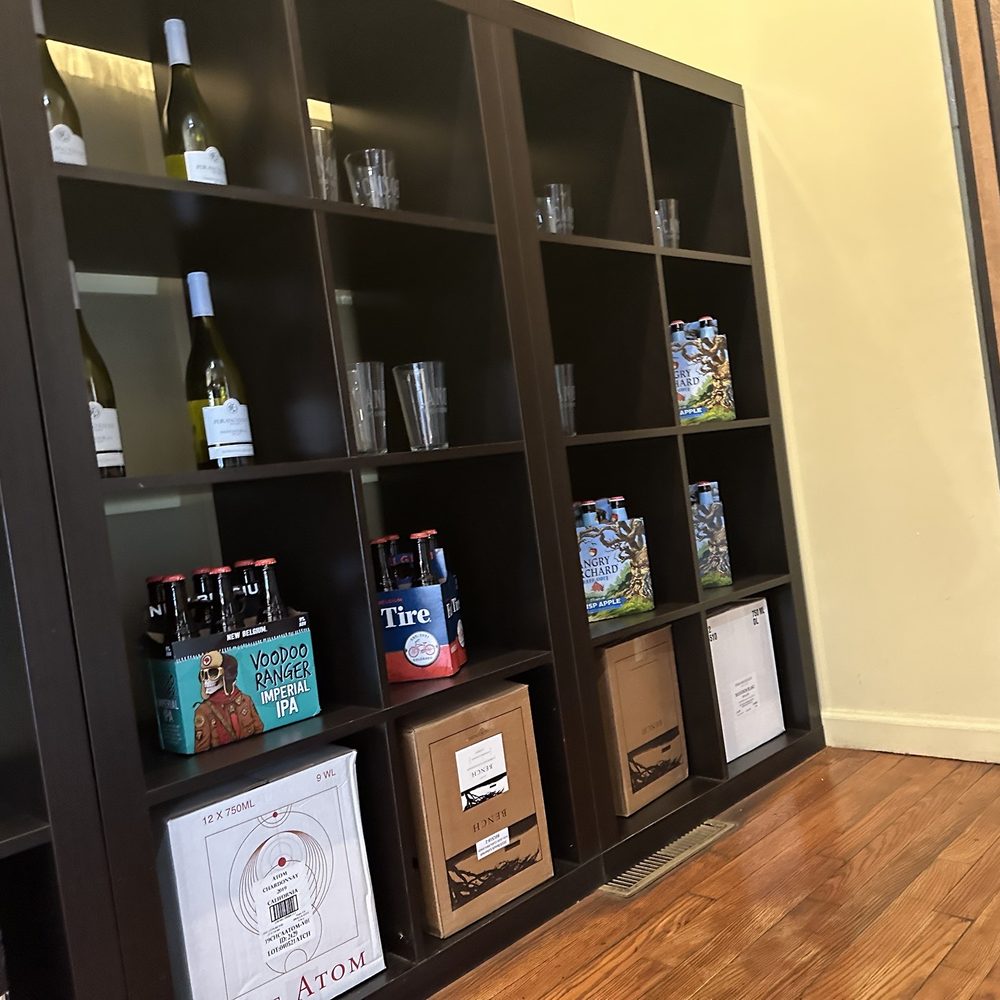 a wine rack with wine bottles a wine rack with wine bottles