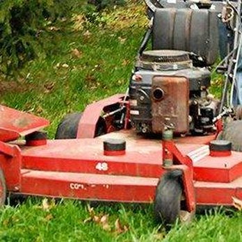 Hoot & Holler - a man mowing a lawn - Junk Removal & Hauling Near Me Hoot & Holler - a man mowing a lawn - Junk Removal & Hauling Near Me