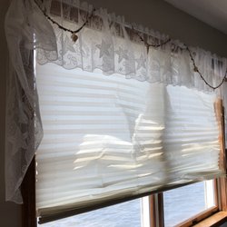 Birchler Realtors - Blinds ripped up we had to tie to keep on window