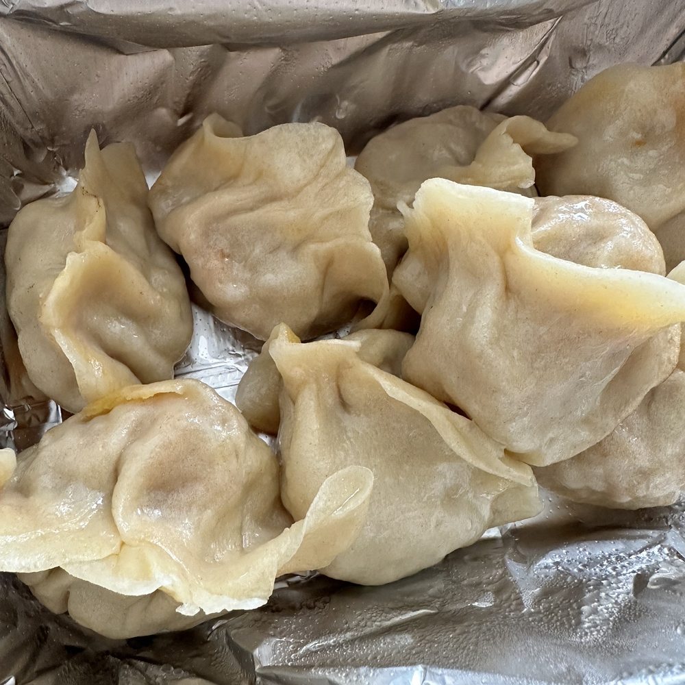 Taigu Noodles - 1. Pan-Fried Dumplings with Pork and Carrots AMAZING! - Chinese Near Me - Middleton, Wisconsin Taigu Noodles - 1. Pan-Fried Dumplings with Pork and Carrots AMAZING! - Chinese Near Me - Middleton, Wisconsin