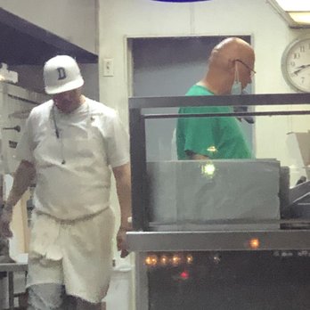 Joes Pizza Pasta & Subs - Staff members with no gloves or masks handling food. - Italian Near Me - Carrollton, Texas