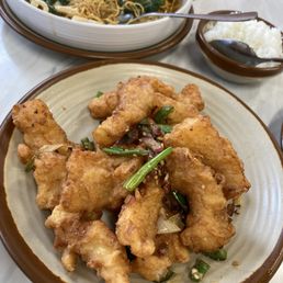Salt and pepper grouper. House special fried noodle in the background.