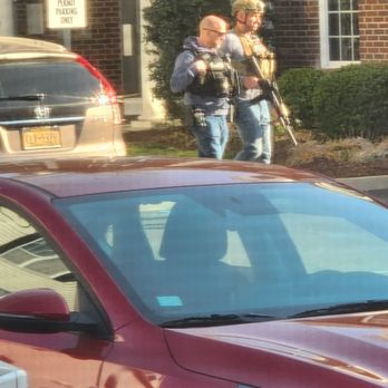 Avalon Garden City - US Marshals with assault rifles and riot gear, outside our unit all day, waiting to arrest. - Apartments Near Me - Garden City, New York Avalon Garden City - US Marshals with assault rifles and riot gear, outside our unit all day, waiting to arrest. - Apartments Near Me - Garden City, New York