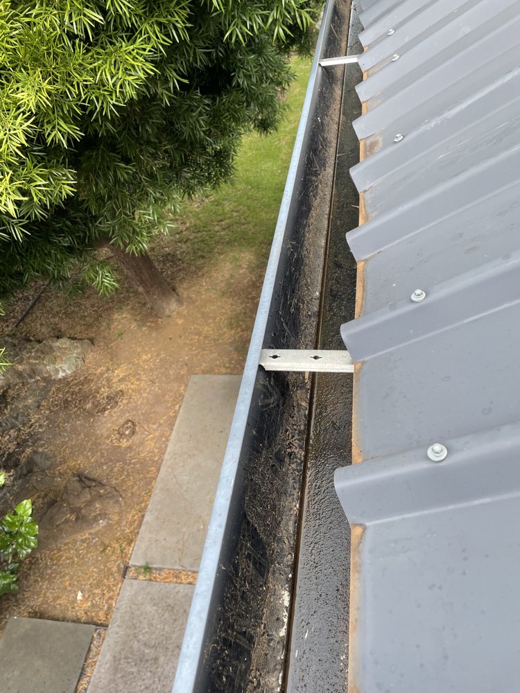 Slide of Ace Roof & Gutter Cleaning