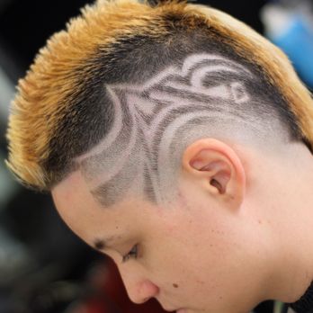 TapatCutz - A burst fade faux hawk w/ a creative freestyle design - Barbers Near Me - Waipahu, Hawaii TapatCutz - A burst fade faux hawk w/ a creative freestyle design - Barbers Near Me - Waipahu, Hawaii