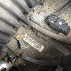 B&B Auto Service - This was the broken ground cable he didn't fix, which was the real cause of my problem and easy to see. I fixed the problem myself.