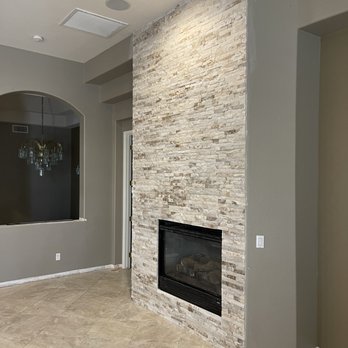 Homewood Construction - a living room with a fireplace - General Contractors Near Me Homewood Construction - a living room with a fireplace - General Contractors Near Me