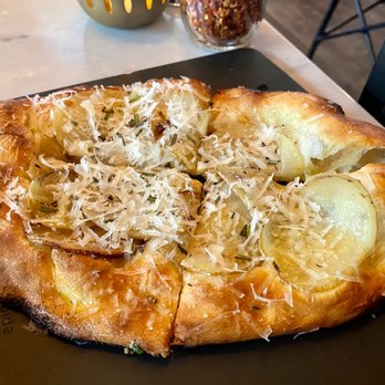 Serious Pie Downtown - Potato Pizza - yukon gold potato, pecorino romano, rosemary - Pizza Near Me - Seattle, Washington