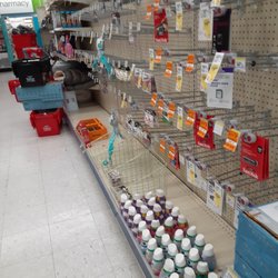 Walgreens - 2 days after mentioning the battery aisle was empty & blocked w/ store carts & unshelved items. It hasn't changed since that time.
