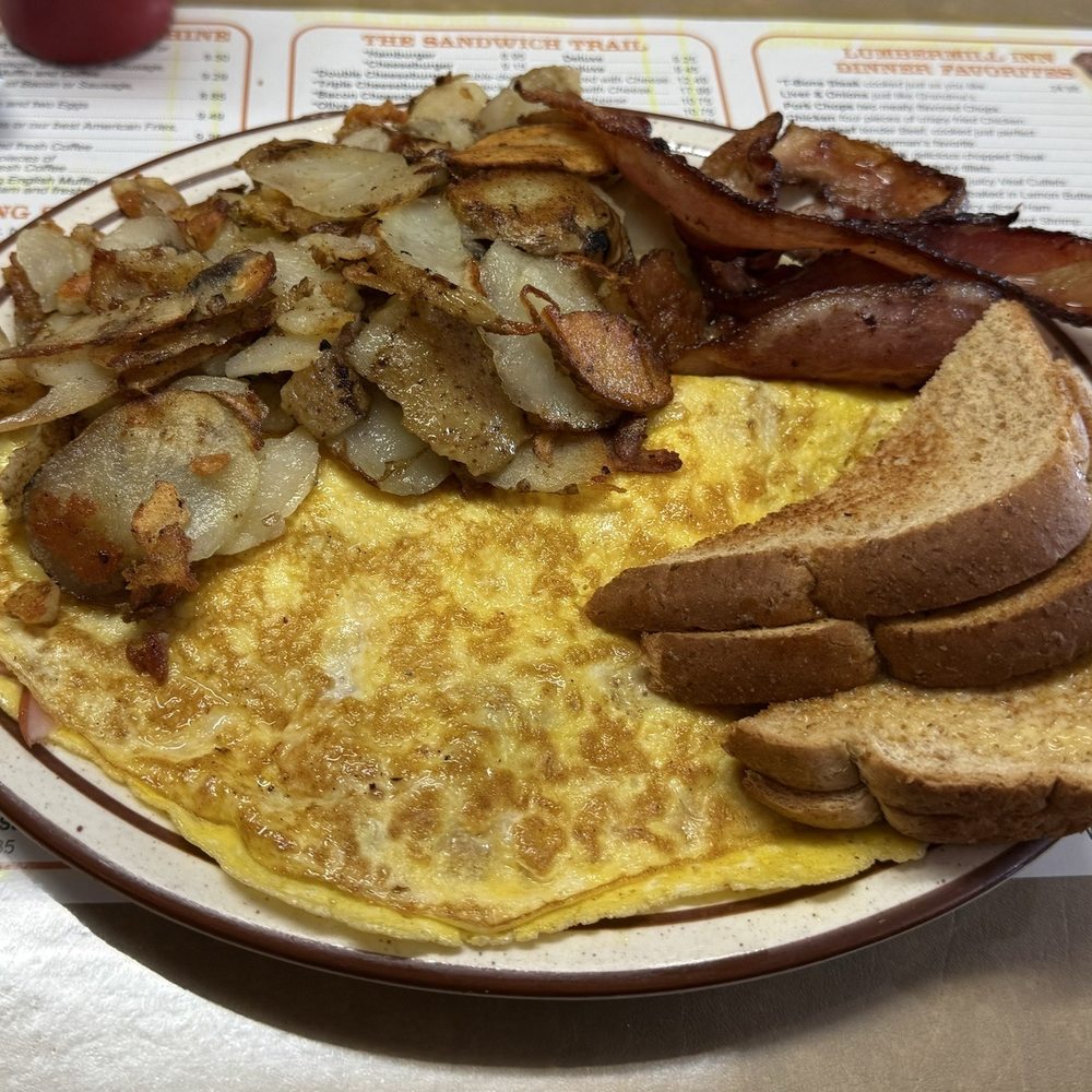Lumber Mill Inn - Ham & Cheese Omelette, home fries, bacon, and wheat toast m. - Restaurants Near Me - Muir, Michigan