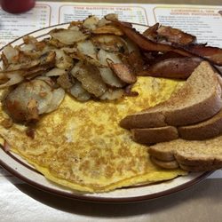 Lumber Mill Inn - Ham & Cheese Omelette, home fries, bacon, and wheat toast m.