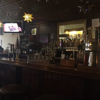 Monkey House - a bar with stools and a television - Bars Near Me - Winooski, Vermont
