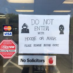 Burley Store - Ahhhh... tacky hand-written, permanently fixed signage.