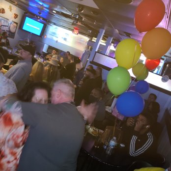 The Hideout - a group of people at a party - Bars Near Me - Schaumburg, Illinois The Hideout - a group of people at a party - Bars Near Me - Schaumburg, Illinois