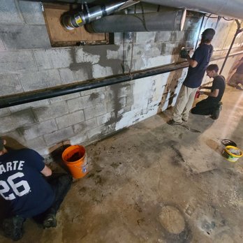Bright Basements - two men working on a basement - General Contractors Near Me Bright Basements - two men working on a basement - General Contractors Near Me