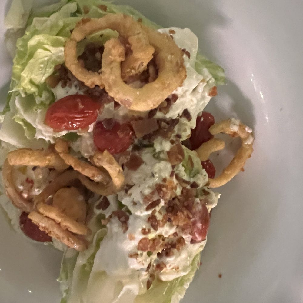 Davio's - Baby Iceberg, Bacon, Tomatoes, Crispy Shallots, Blue Cheese - Steakhouses Near Me - King of Prussia, Pennsylvania Davio's - Baby Iceberg, Bacon, Tomatoes, Crispy Shallots, Blue Cheese - Steakhouses Near Me - King of Prussia, Pennsylvania