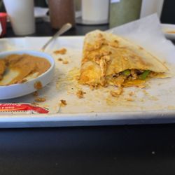 Walk & Taco - The other half of a Chicken Fajita Quesadilla with the refried beans