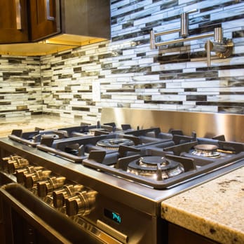 Straightedge Construction - a kitchen with stainless steel appliances - General Contractors Near Me - Missoula, Montana Straightedge Construction - a kitchen with stainless steel appliances - General Contractors Near Me - Missoula, Montana