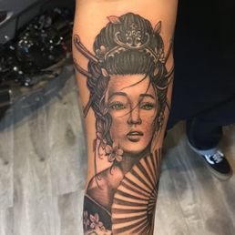 Geisha cover up on a old crown tattoo