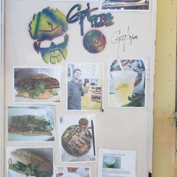 a refrigerator covered in pictures a refrigerator covered in pictures