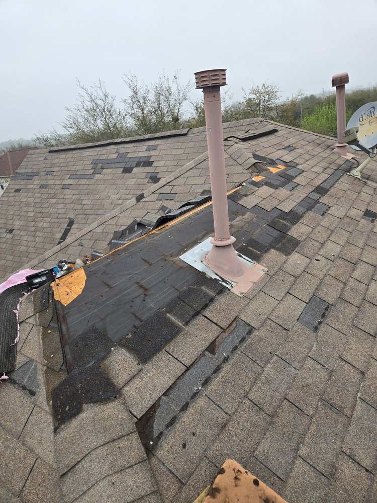 Slide of Hurtado's Roofing