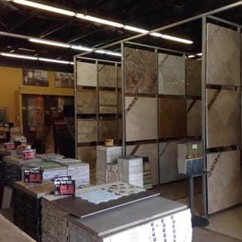 Tile and Stone 4rce - a large room with a lot of tile and stone - Kitchen & Bath Near Me - Chula Vista, California