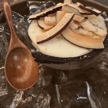 Ember & Vine - Keylime pie gelato served in a coconut shell with toasted shavings of coconut - Mediterranean Near Me - Coral Springs, Florida Ember & Vine - Keylime pie gelato served in a coconut shell with toasted shavings of coconut - Mediterranean Near Me - Coral Springs, Florida
