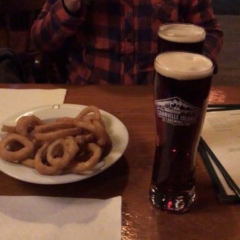 Tommy's Neighbourhood Pub - Onion rings and a couple of pints - Pubs Near Me - Banff, Alberta
