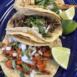 Los Tres Hermanos Restaurant - Tacos - bottom to top: chorizo, steak and chicken