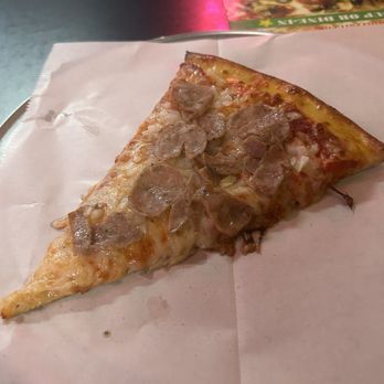 Giovanni's Pizzeria & Kitchen - Sausage and onion pizza slice - Italian Near Me - Davenport, Florida Giovanni's Pizzeria & Kitchen - Sausage and onion pizza slice - Italian Near Me - Davenport, Florida