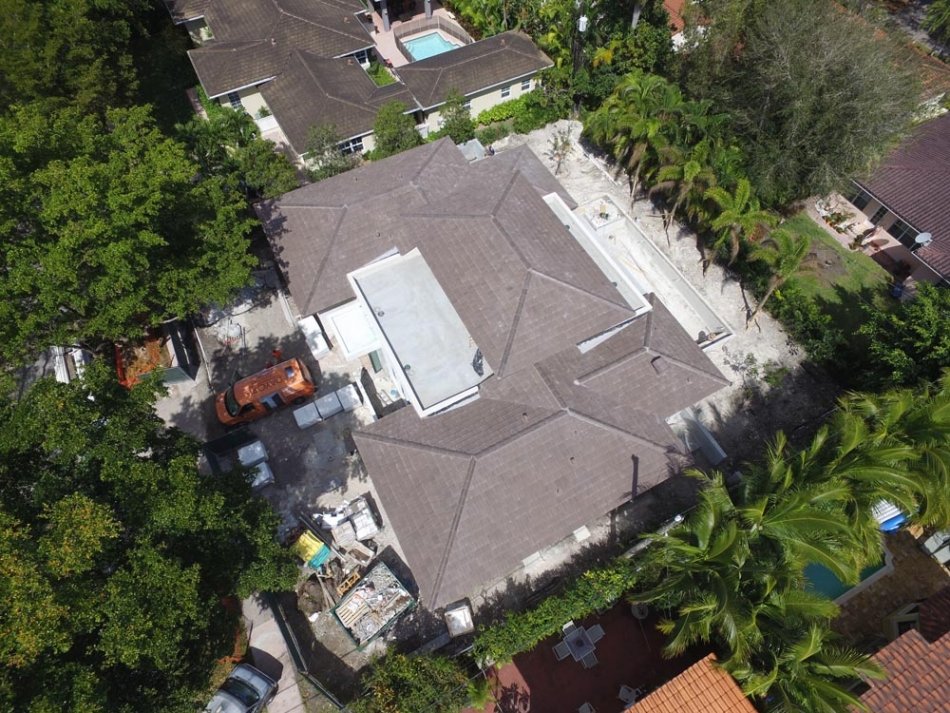 Slide of Caye Works Roofing