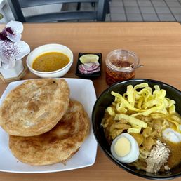 Must try Burmese restaurant. I had Shwe Taung noodle, a cup of sweet Indian tea and paratha with curry dip. Must try Burmese restaurant. I had Shwe Taung noodle, a cup of sweet Indian tea and paratha with curry dip.