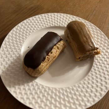 Au Petit Versailles du Marais - Chocolate eclair (cut in half) Coffee eclair (cut in half) - Bakeries Near Me - Paris, 75 Au Petit Versailles du Marais - Chocolate eclair (cut in half) Coffee eclair (cut in half) - Bakeries Near Me - Paris, 75