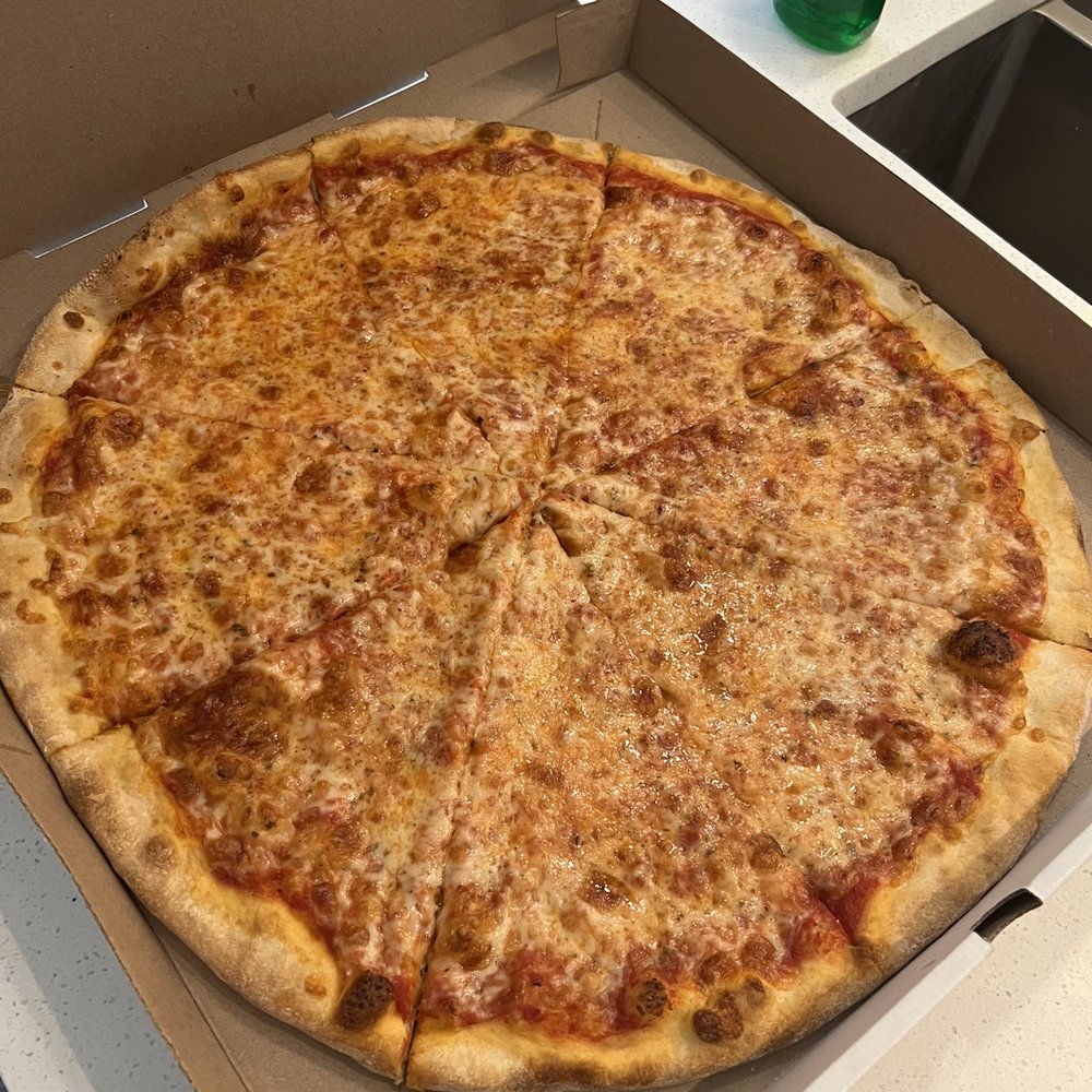 a cheese pizza in a box a cheese pizza in a box