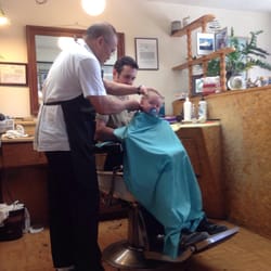 Chris Barber - This guy must be great. Daddy holding 8 month old for 1st haircut.