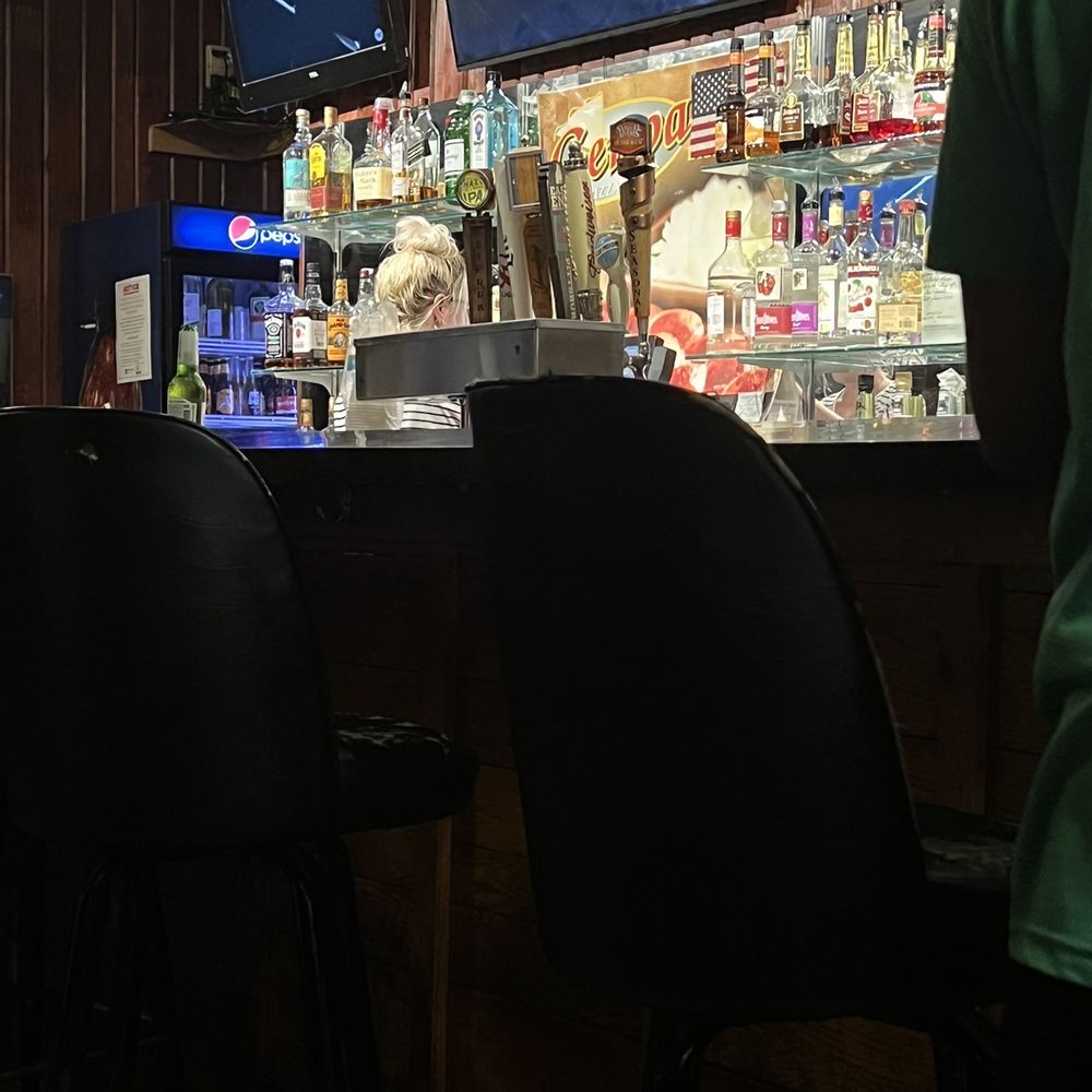 Genoa Pizza & Bar - a man sitting at the bar - Pizza Near Me - Pittsburgh, Pennsylvania Genoa Pizza & Bar - a man sitting at the bar - Pizza Near Me - Pittsburgh, Pennsylvania