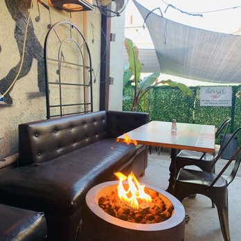 Sage Social Eatery - Super cute outdoor patio. We were there on a chilly morning but the fire pit was a great solution. - Latin American Near Me - Covina, California