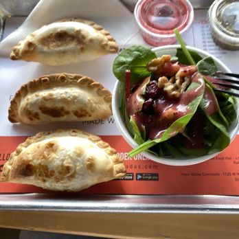 Makus Empanadas - This is one chicken, one beef and one pork chimichurri. It's also a spinach salad. - Empanadas Near Me - Durham, North Carolina