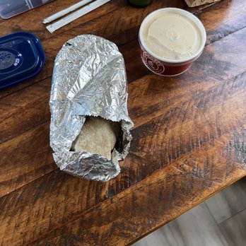 Chipotle Mexican Grill - Burrito thrown in bag like this. - Mexican Near Me - Corinth, Texas