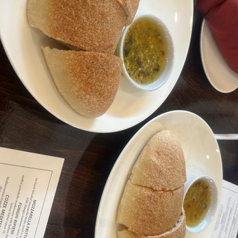 Mangia Bistro - Complimentary Loaf of Bread and oil - Italian Near Me - Plano, Texas Mangia Bistro - Complimentary Loaf of Bread and oil - Italian Near Me - Plano, Texas