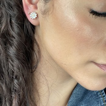 Ava Piercing Company - Three stone, rose gold stud.  Please disregard the daisy. - Piercing Near Me - Temecula, California