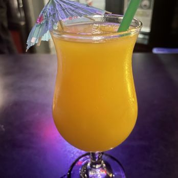 Lottie's Lounge - Mango slushie on the board ($11) - Breakfast & Brunch Near Me - Seattle, Washington Lottie's Lounge - Mango slushie on the board ($11) - Breakfast & Brunch Near Me - Seattle, Washington