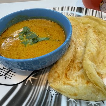 Goku Kitchen - #A16. Roti Paratha with Curry (Indian Pancake) () - Asian Fusion Near Me - Staten Island, New York Goku Kitchen - #A16. Roti Paratha with Curry (Indian Pancake) () - Asian Fusion Near Me - Staten Island, New York